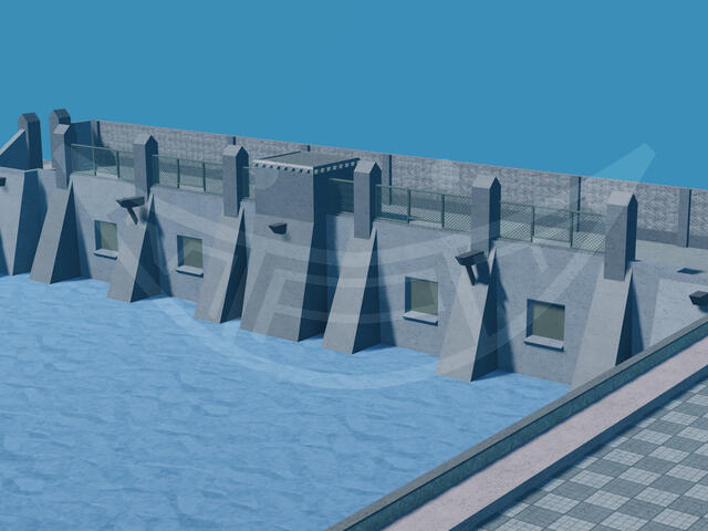 A small concrete dam with green metal safety fences covering the edges.