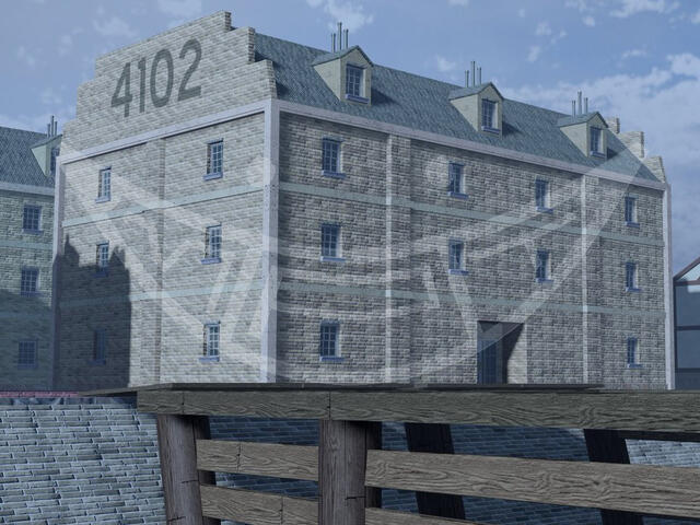 A three-story European styled brick apartment building.